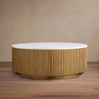 Table basse ronde sculpturale en marbre de Carrare, base en chêne cannelé de luxe, table centrale moderne et unique pour salon