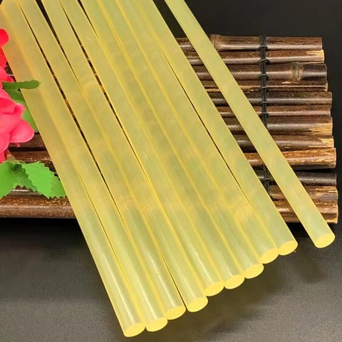 Transparent Yellow Hot Melt Glue Stick UV Cured for Construction Packing Woodworking Flooring 1kg MOQ Composed of Resin Silicone