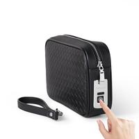 Porte-documents fiable à verrouillage par empreinte digitale pour hommes, en PU, protection antivol, chargement USB et portable