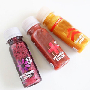 Vacío De plástico reciclable prensado en frío Fiery <span class=keywords><strong>Ginger</strong></span> <span class=keywords><strong>Shot</strong></span> 60ml Forma redonda PET Botellas de jugo Mini 2oz Inmunidad Wellness Shots - Product Image 1