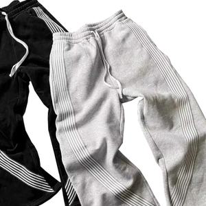 กางเกงลำลองลายทางสำหรับผู้ชายมาใหม่กางเกงวอร์มทรงหลวมเอวยางยืดมีเชือกรูดแนวฮิปฮอปกางเกงวิ่ง - Product Image 6