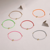 Bracelet en argent S925 avec pierre unique sertie de moissanite, cordon en nylon coloré et monture dorée, réglable et empilable, pour usage quotidien et loisirs