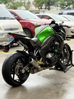 Moto naked Kawasaki 1Z1000 d'occasion, essence, 1000 cm³, moteur quatre cylindres, suspension réglable, plusieurs modes de puissance, puissante