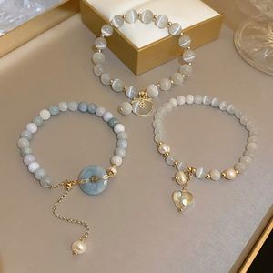 Bracelet artisanal de haute qualité en perles d'eau douce exquises, avec opale, œil de chat porte-bonheur et jade, pour femme - Product Image 1