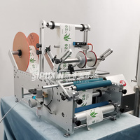 Étiqueteuse manuelle électrique de bouteilles rondes pour l'emballage de boissons alimentaires-pour boîtes métalliques en papier de verre-État neuf
