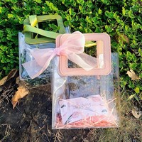 Sac à main transparent en PVC, vente chaude, sac cadeau portable en plastique personnalisé, sac de rangement et d'emballage en PVC imperméable, vente en gros