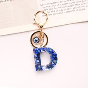 Nouveau Style bleu royal 26 alphabet anglais porte-clés oeil <span class=keywords><strong>du</strong></span> <span class=keywords><strong>diable</strong></span> lettre majuscule pendentif sac femme - Product Image 4