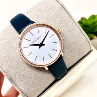 Montre pour femme coréenne en acier inoxydable or rose avec bracelet en PVC, cadran analogique simple à quartz, chronographe et affichage à double aiguille, lunette