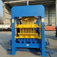 Machine automatique hydraulique de fabrication de blocs de béton QT4-15 avec changement rapide de moule pour blocs creux, pleins et pavés