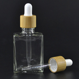 Frasco cuentagotas de botellas de vidrio transparente de aceite esencial de 30ml con tapa de Bambú - Product Image 2