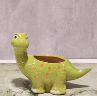 Un vendeur chaud de récipients succulents en céramique de dinosaure