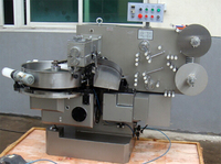 Machine d'emballage industrielle pour petits bonbons caramel, toffee, gommes, chocolats, bonbons enrobés, sucettes individuelles torsadées