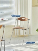 Chaise pliante de designer minimaliste du milieu du siècle avec structure en acier inoxydable, durable et portable, chaise de salle à manger de luxe pour la maison
