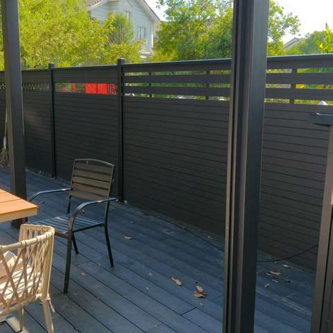 Durable WPC Slat Fence with Aluminum Frame for Side Yard Narrow Design Enhances Aesthetic Appeal