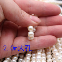 Perle d'eau douce naturelle presque ronde de haute qualité de 7 à 8mm avec un trou de grande taille de 2mm