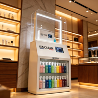 Vitrine LED en métal OEM ODM avec écran tactile, vitrine en verre verrouillable pour la vente au détail de cosmétiques et de produits de nettoyage