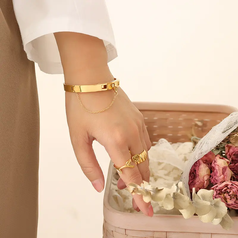 XIXI Acier Gelang Bangle perhiasan mode baja tahan karat wanita desain berlapis emas 18K gesper rumbai terbuka mewah tidak beracun