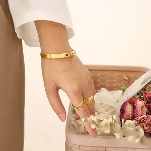 Pulseiras de aço inoxidável para mulheres, pulseiras luxuosas com fecho de borla aberta 18K banhadas a ouro XIXI Acier
