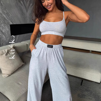 Vente de gros Nouveau caraco court teint uni d'été pour femmes, décontracté, régulier, tricoté, pantalon à jambes larges, ensemble Homewear