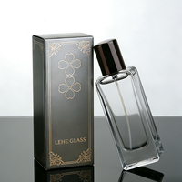 Flacon de parfum en verre de luxe vide de 50 ml avec bouchon en alliage de zinc, impression personnalisée du logo, boîte d'emballage, contenant de parfum classique