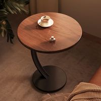Table basse ovale avec plateau en marbre et structure en métal, design minimaliste moderne, meubles de salon
