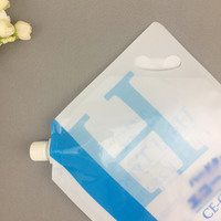 Pochette à bec de qualité alimentaire conçue en usine pour les cosmétiques de soins de la peau en gel sac en plastique avec support de buse pour l'emballage