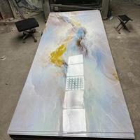 Panneaux muraux 3D en PVC à prix avantageux avec texture marbre, isolation phonique et thermique UV pour usage intérieur