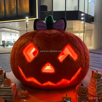 Citrouille gonflable lumineuse en peluche avec nœud pour la décoration commerciale, la publicité et les grands événements de la fête d'Halloween