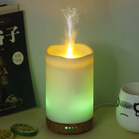 Machine d'aromathérapie à bougie simulée électrique unique Humidificateur d'air domestique Diffuseur d'huiles essentielles avec veilleuse LED