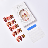 Lot de 24 faux ongles à presser, transfrontaliers, de Noël, en forme d'amande, avec fleurs 3D, flocons de neige plaqués or et nœuds, peints à la main, pré-dessinés, style mignon