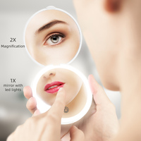 Miroir de poche compact à pli cosmétique en plastique ABS avec lumière LED Miroir de maquillage portable rond personnalisé à la mode