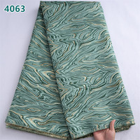 Tissu en dentelle brodée africaine bleue unie en gros 2025, dentelle damassée dorée brodée à la française pour robes de mariée femme 4063