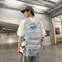 Sac à dos graphique noir et blanc grande capacité multi-poches décontracté pour femme, idéal pour un usage quotidien (vente en gros)