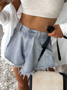 Pantalones cortos de mezclilla para mujer con cintura Mig Primavera Verano Pantalones cortos de empalme con agujeros de mezclilla Sexy Club Loose Tassel Booty Shorts - Product Image 3