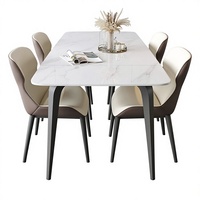 Table à manger en pierre frittée personnalisable de luxe léger avec pieds en forme d'éléphant, design rectangulaire moderne et simple pour petits appartements