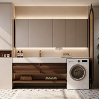 Meuble-lavabo intégré sur mesure pour salle de bain et balcon avec espace pour machine à laver, vasque en pierre frittée courbée à chaud