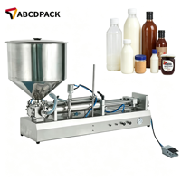 Machine de remplissage de bouteilles semi-automatique avec trémie en acier inoxydable 304 pour miel, pâte, sauce, crème cosmétique