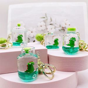 Llavero Creativo de Dinosaurio Verde con Arena Movediza, Colgante para Bolsa, Llavero con Aceite, Adorno Decorativo para Coche, Regalo de Navidad para Niños - Product Image 1