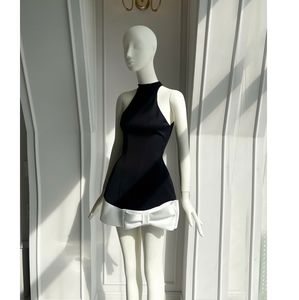 Coshe Modest Style Midi Length Woven <b>Dress</b> Elegant White with Black <b>Halter</b> Neck Bow Detail Feminine Chic High Quality Wholesale - Product Image 1