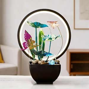 Fontaine électrique ronde avec éclairage arrière, ornement de fleurs, de fées et de papillons, pour la décoration de la maison ou du bureau - Product Image 1