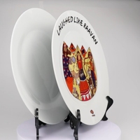 Assiettes décoratives en porcelaine blanche imprimée de logo personnalisé assiettes vierges rondes et plates de sublimation assiettes en céramique de 10 pouces pour restaurants