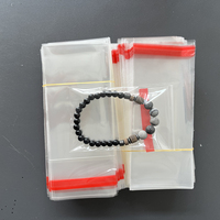 Taille : 6*14cm, Sac BOPP auto-adhésif jetable de petite taille pour l'emballage de bijoux (boucles d'oreilles, colliers, bagues et bracelets)