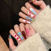 Diseño #2501 Proveedores de salón de uñas Uñas hechas a mano Precio al por mayor ataúd largo Diseño de flores coloridas en 3D Cubierta completa Uñas de gel suave