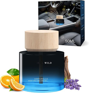 Ambientador para Auto Wild Woody, el Más Vendido, para Hombre, Fragancia Amaderada y Especiada de Lujo, Difusor con Clip para Ventilación de Auto, 50 ml - Product Image 1