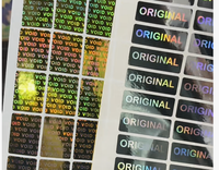 Custom Laser-Cut Black Silver PET Adhesive Anti-Counterfeit Warranty Sticker Roll for Mobile Phones
