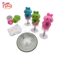 Usine personnalisée drôle dessin animé en forme de confiserie rempli de jouets de bonbons en plastique en gros