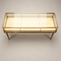 Vitrine de présentation de bijoux en métal doré antique avec pieds, comptoir en verre éclairé pour boutique de joaillerie haut de gamme