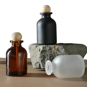Botella de vidrio decorativa de aromaterapia de 100ml con tapa Difusor de perfume para habitación de coche