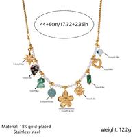 Collier en acier inoxydable étanche style bohème avec breloques, perles et pendentifs multi-fleurs, cœurs et yeux pour femmes - Vente en gros