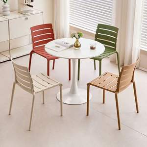 Chaises de salle à manger en plastique empilables sans accoudoirs, de couleur orange, modernes, élégantes, de qualité durable, pour les événements et les fêtes - Product Image 6